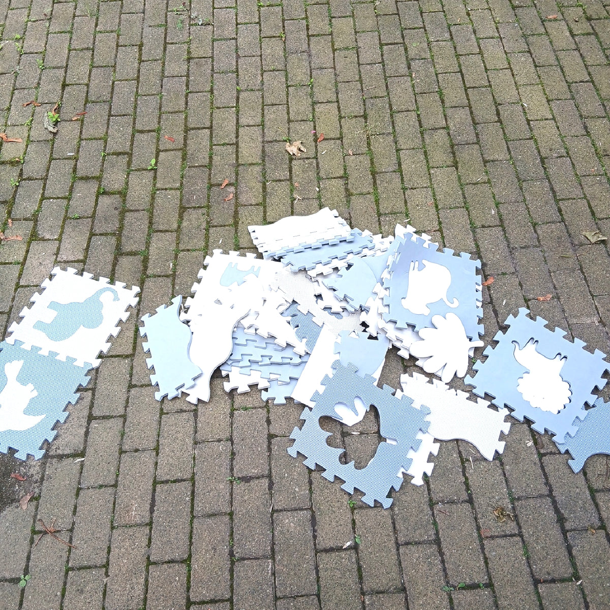 Puzzlematte Spielmatte Bodenschutzmatte grau aus weichem EVA Schaum – Wie neu